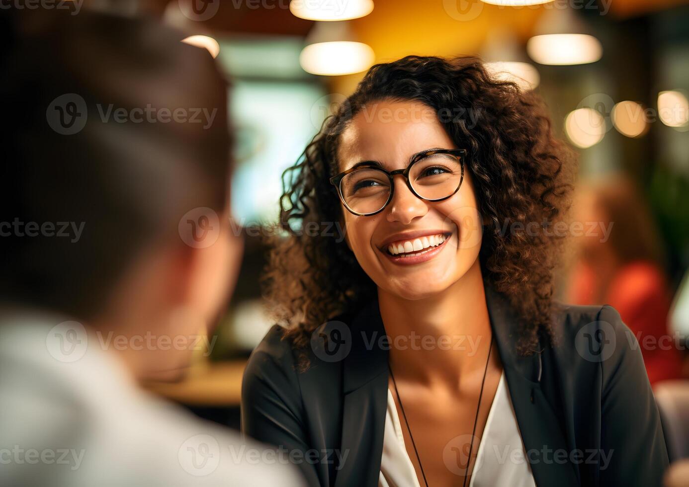 AI generated Smiling confident businesswoman leader in an office with team colleagues worker. Meeting in a boardroom. Using digital tablet and laptop during discussion. photo