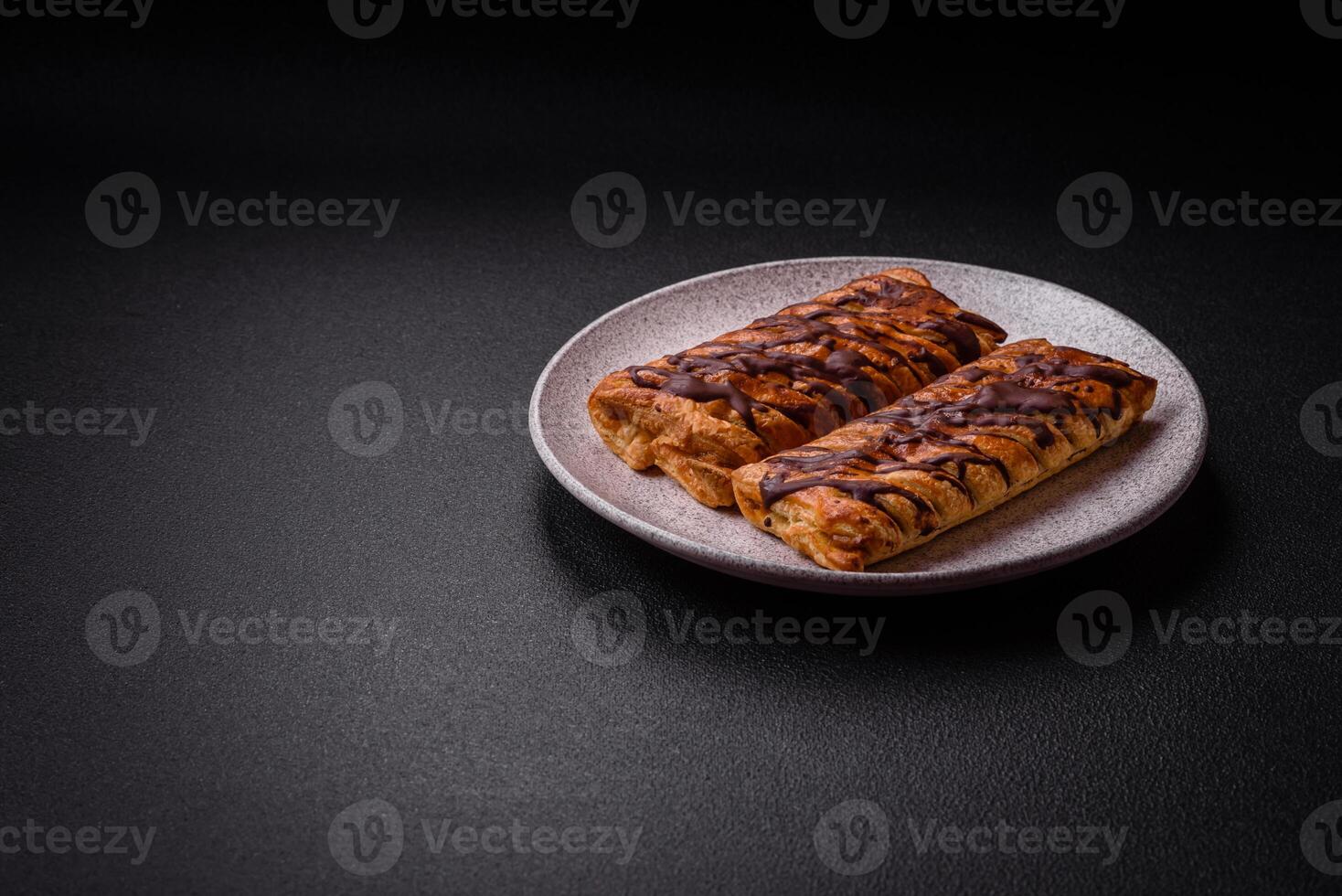 Delicious crispy sweet puff pastry with chocolate and salted caramel photo