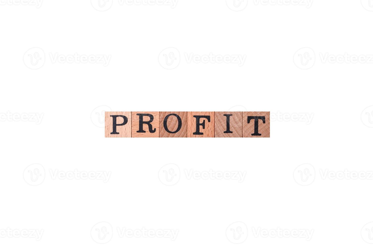 The inscription Profit inspection made of wooden cubes on a plain background photo