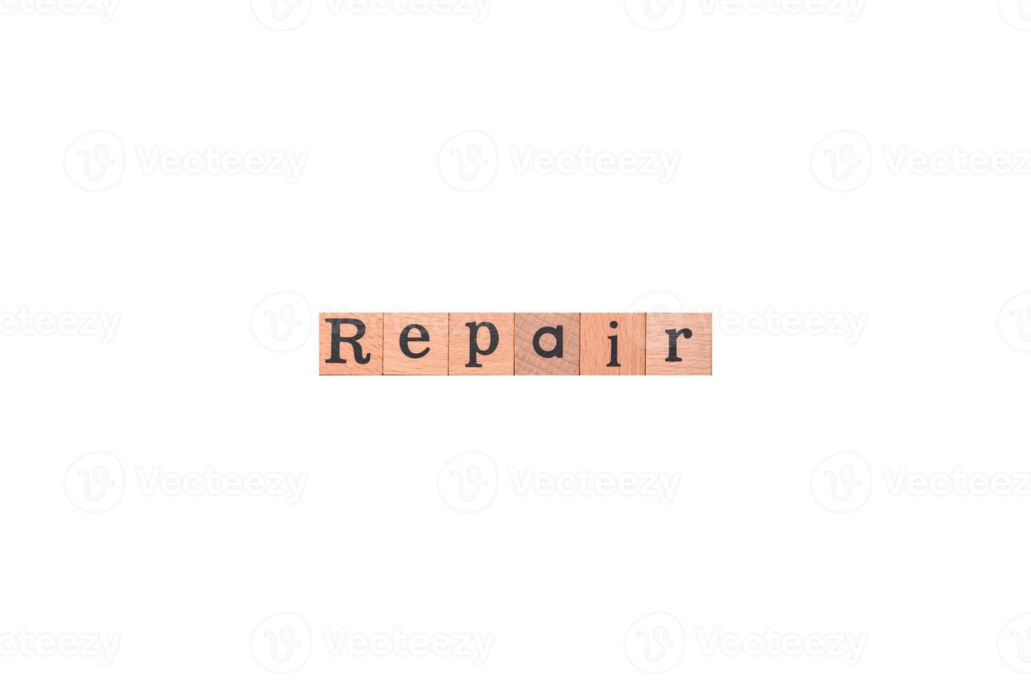 Tools and inscriptions symbolizing repairs or a garage and its attributes on a plain background photo