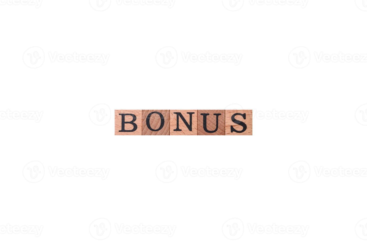 The inscription Tax made of wooden cubes on a plain background photo