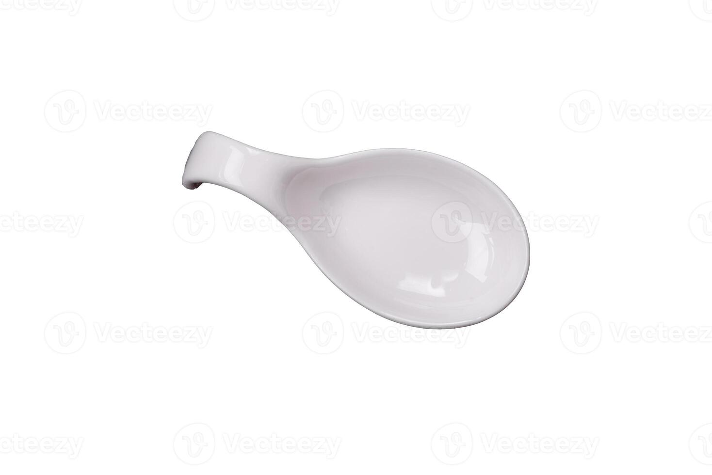 Beautiful empty white ceramic gravy boat on a textured concrete background photo