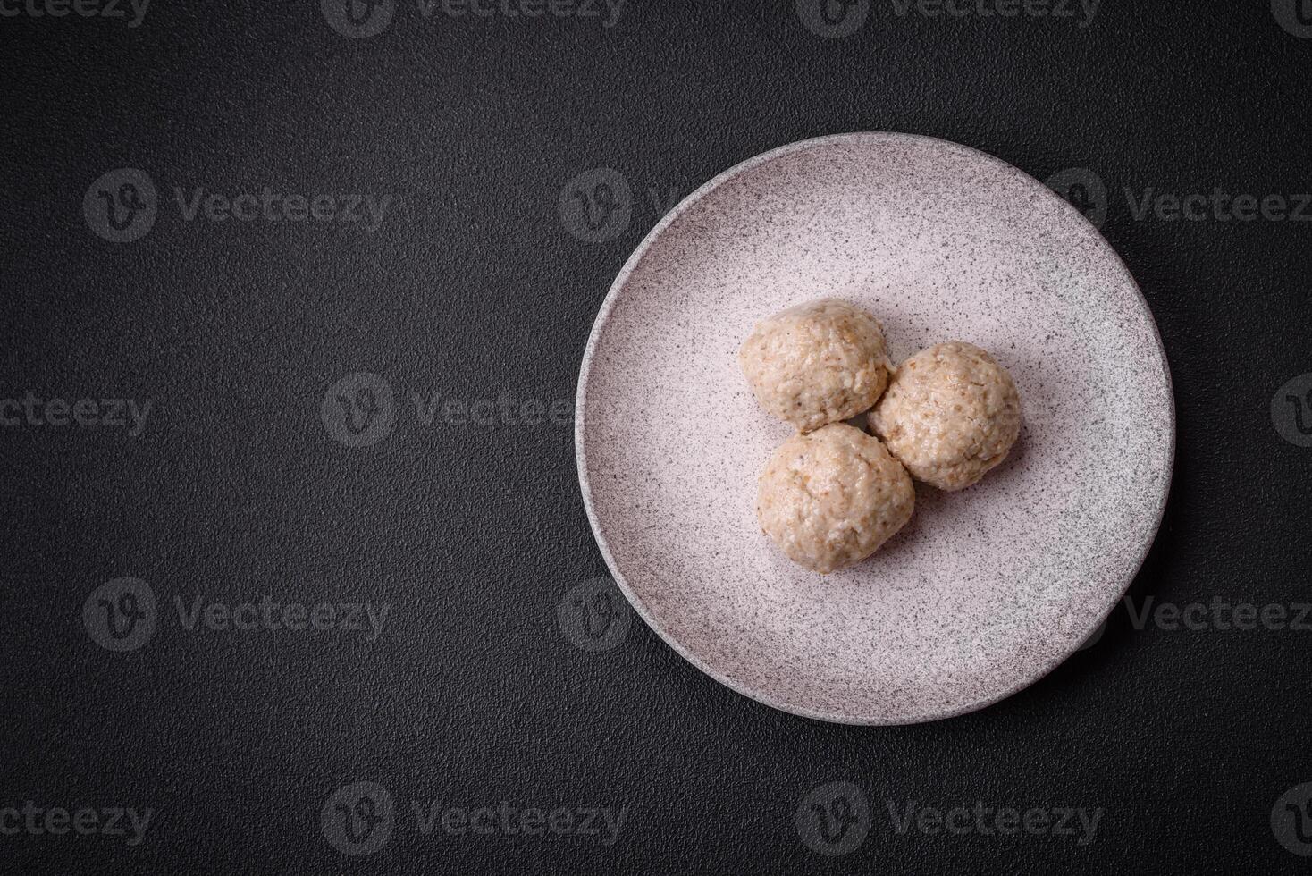 Delicious healthy steamed chicken cutlets or minced meatballs photo