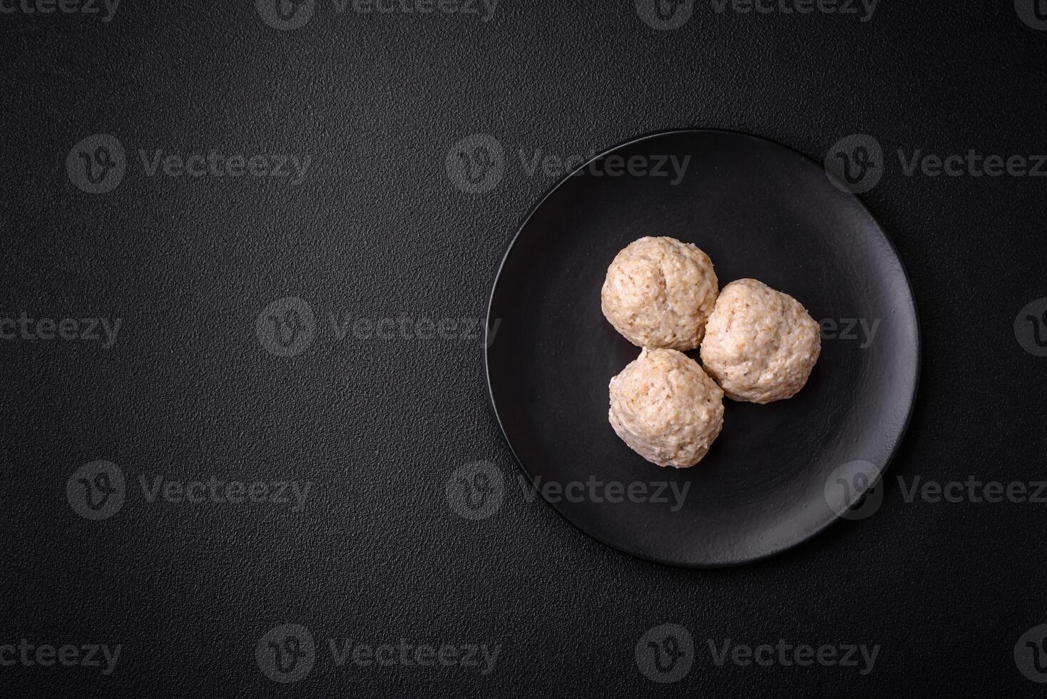 Delicious healthy steamed chicken cutlets or minced meatballs photo