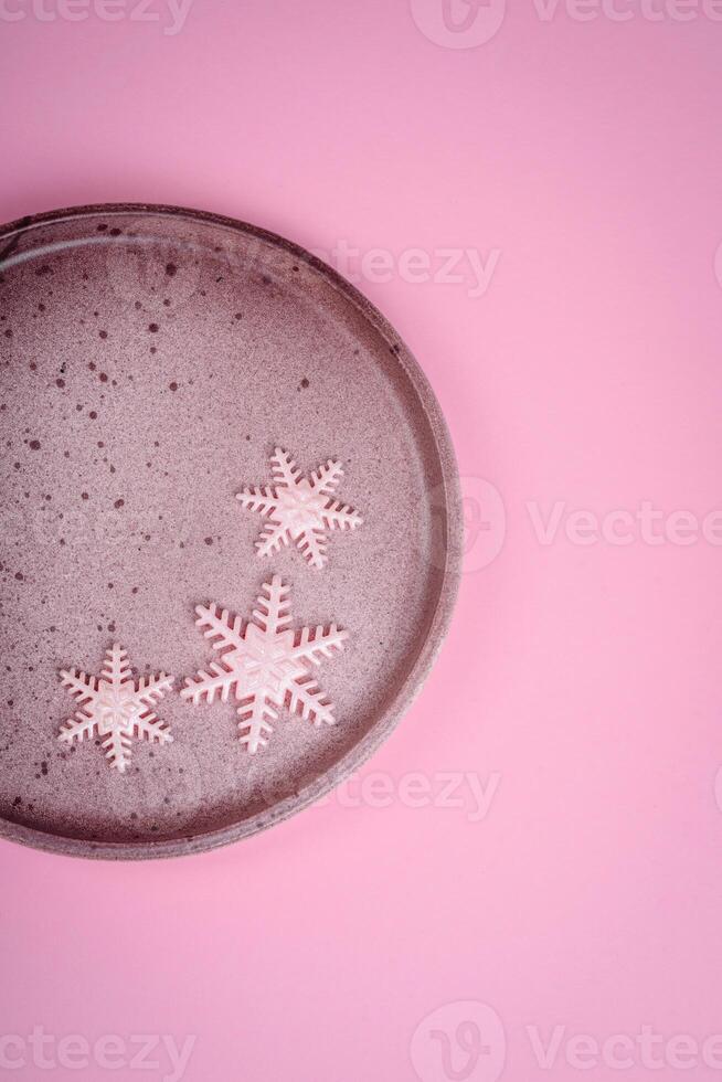 Beautiful winter snowflakes on a plain background with copy space photo