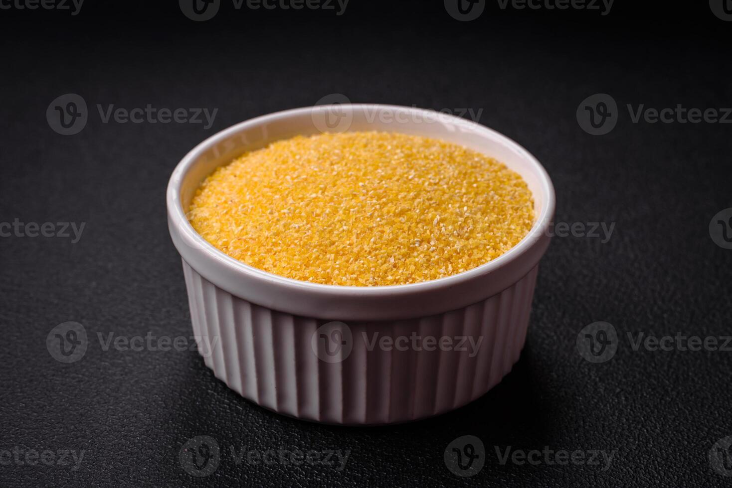 Corn grains or particles are yellow in color when raw photo