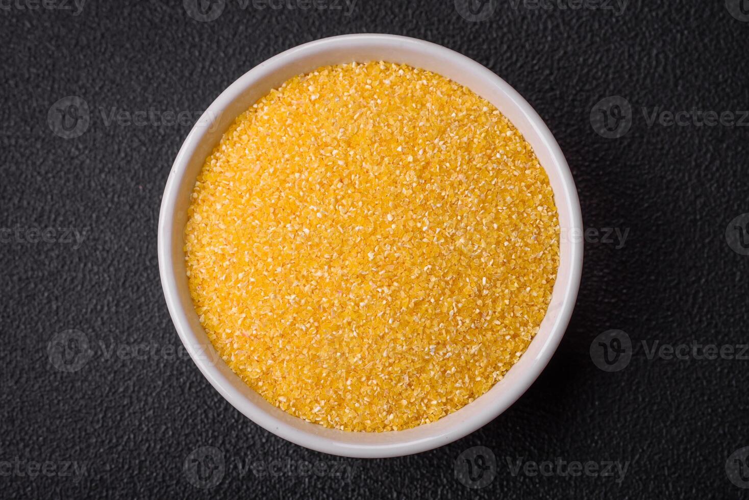 Corn grains or particles are yellow in color when raw photo