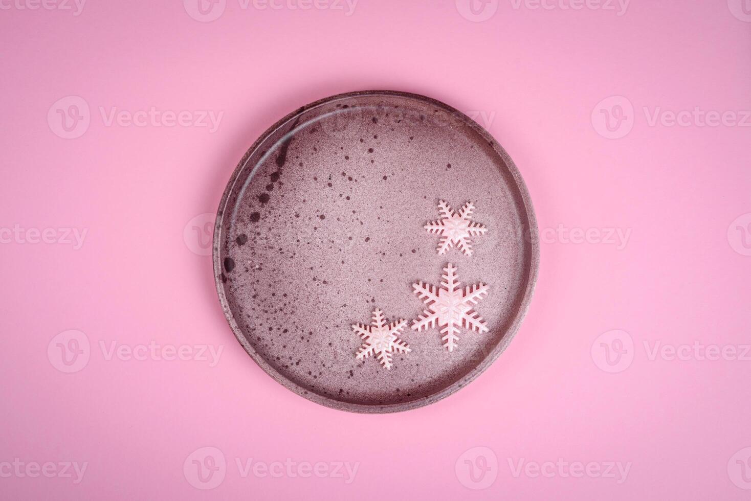 Beautiful winter snowflakes on a plain background with copy space photo