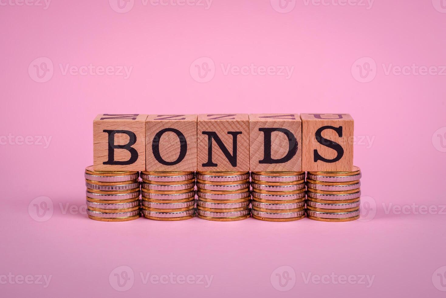 The inscription Bonds made of wooden cubes on a plain background photo