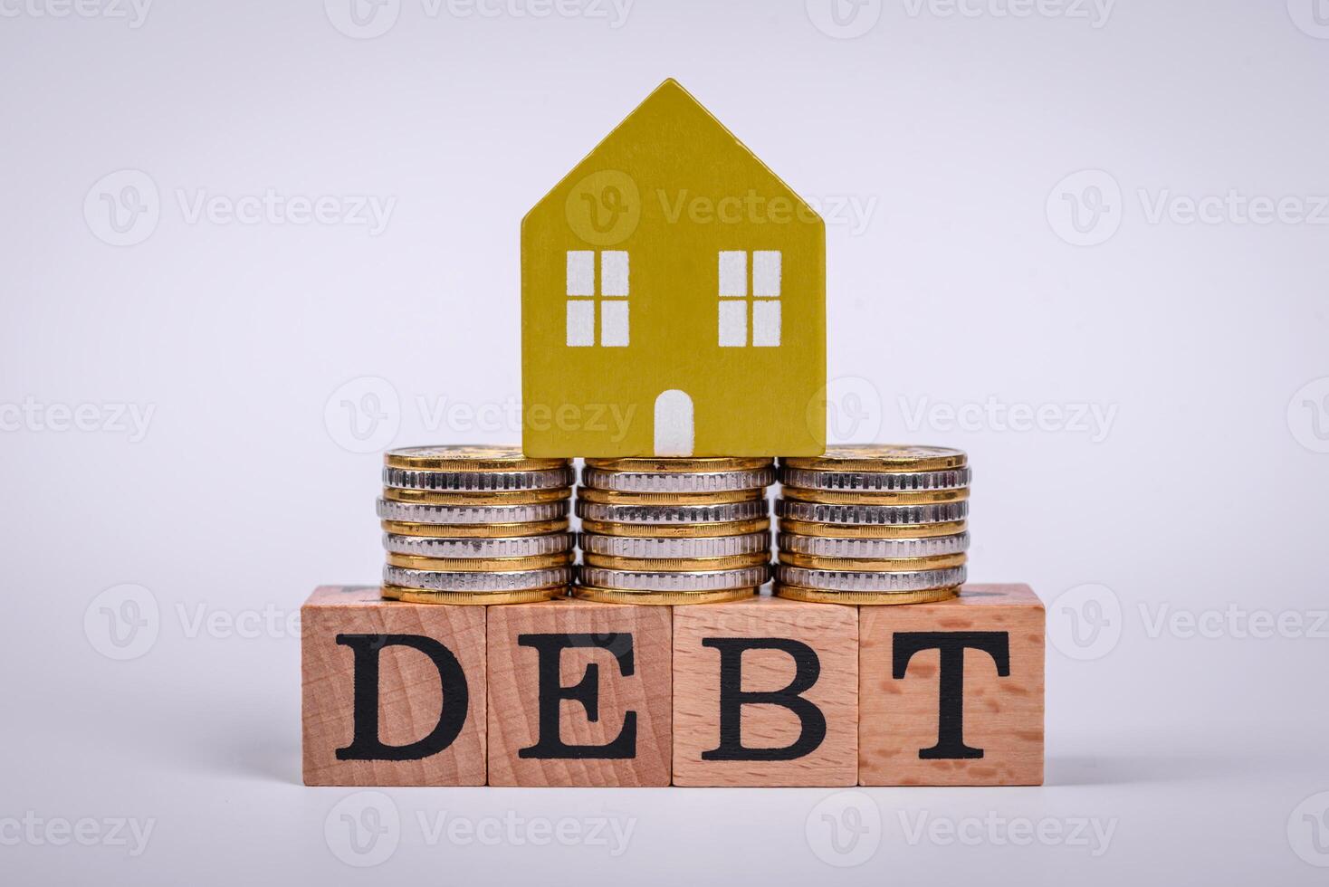 The inscription Debt inspection made of wooden cubes on a plain background photo