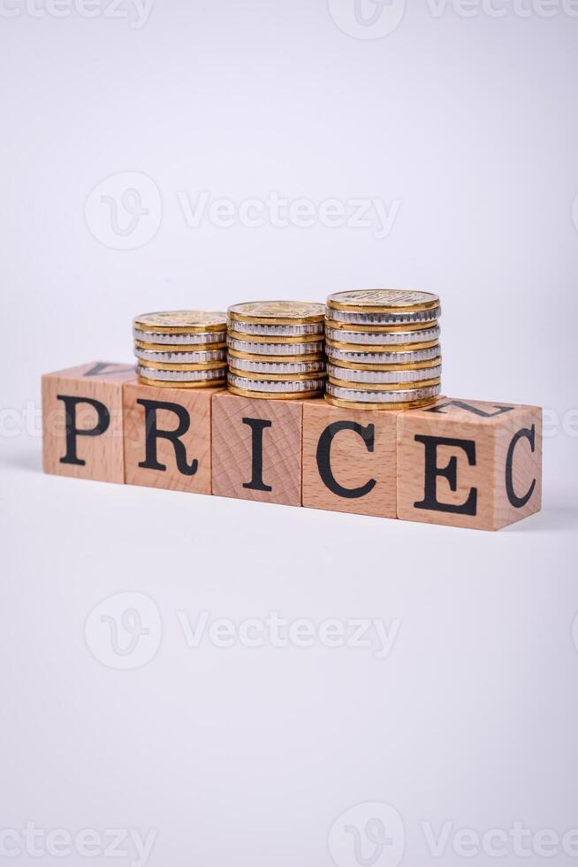 The inscription Price inspection made of wooden cubes on a plain background photo