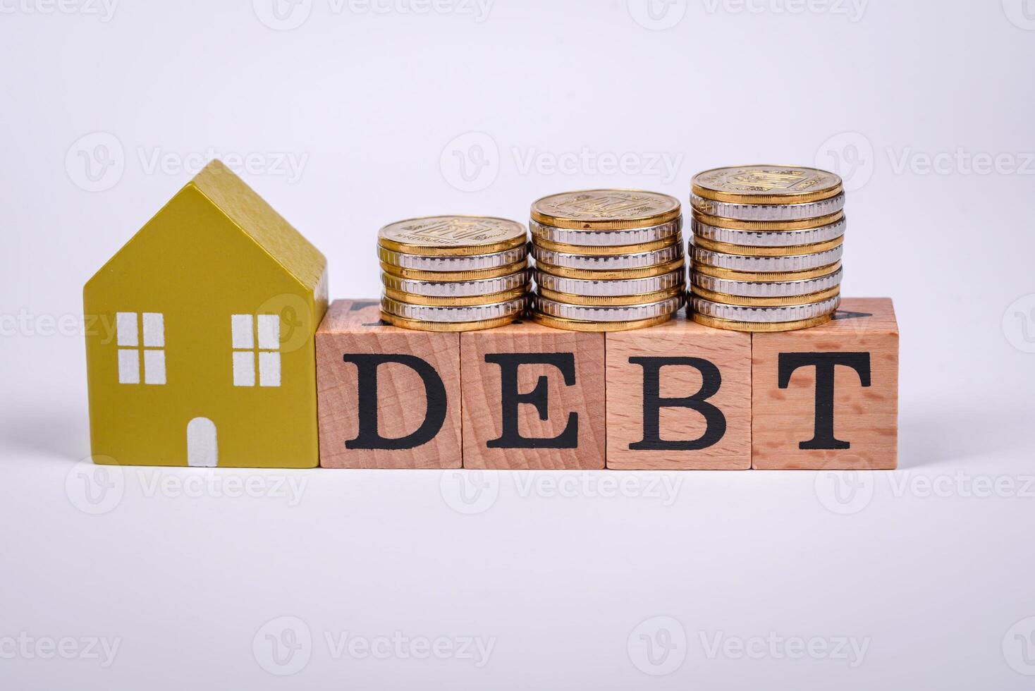 The inscription Debt inspection made of wooden cubes on a plain background photo