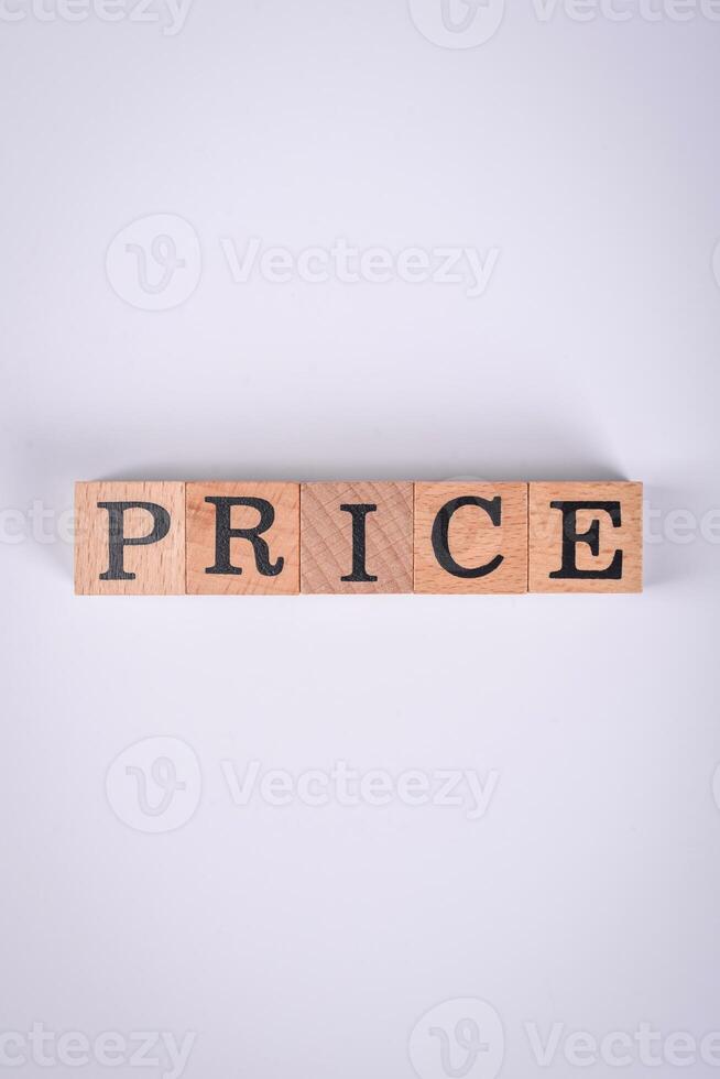 The inscription Price inspection made of wooden cubes on a plain background photo