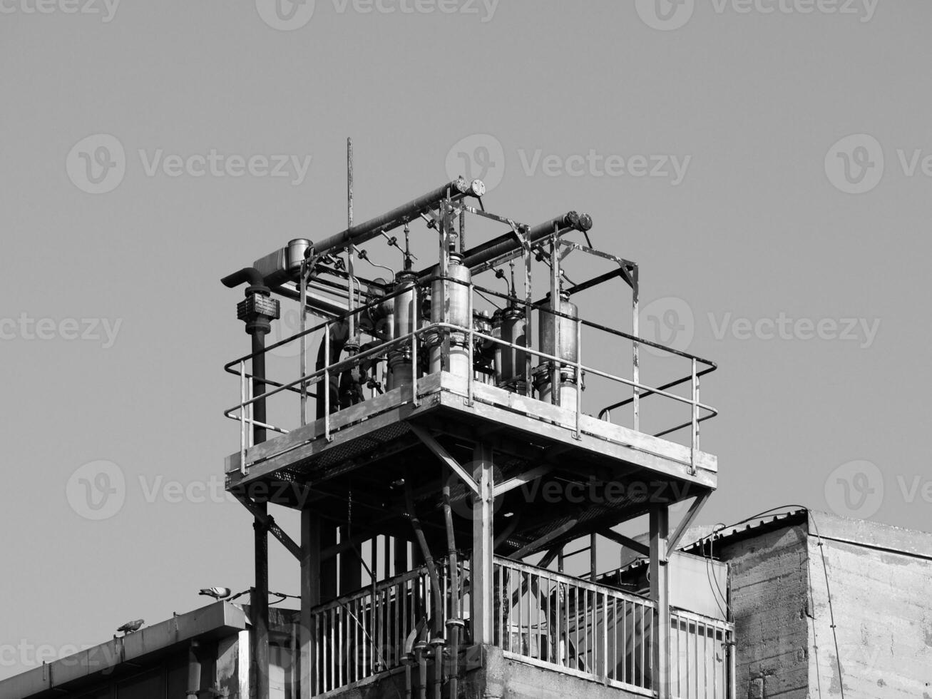 abandoned factory ruins in black and white photo