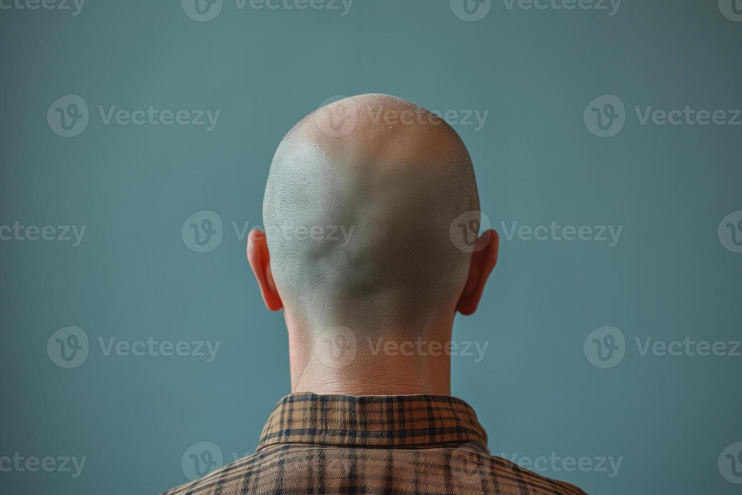 AI generated Anonymous Bald Figure, Teal Backdrop photo