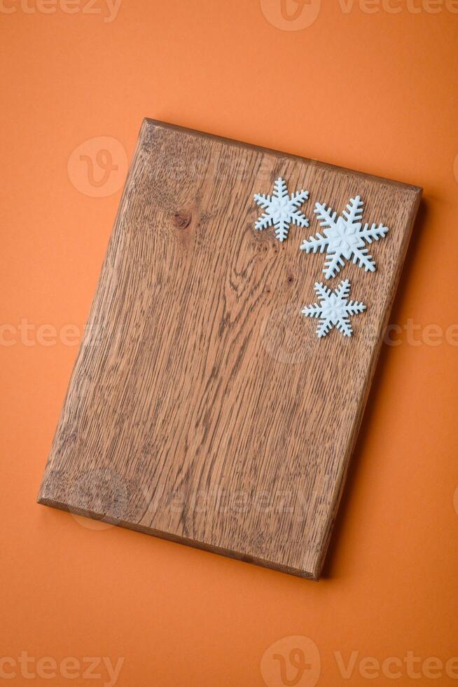 Beautiful winter snowflakes on a plain background with copy space photo