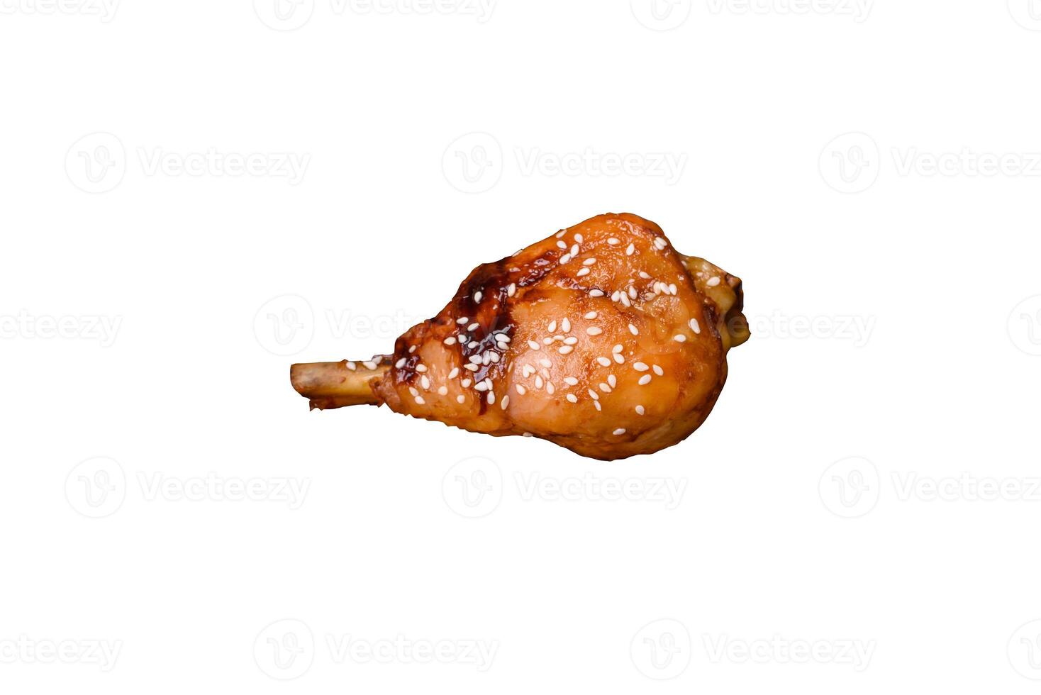 Delicious Asian dish with chicken legs in teriyaki sauce with salt and spices photo