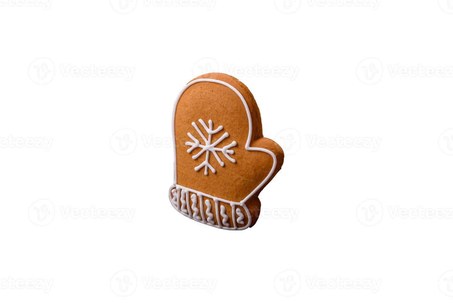 Beautiful delicious sweet winter Christmas gingerbread cookies on a bronze textured background photo