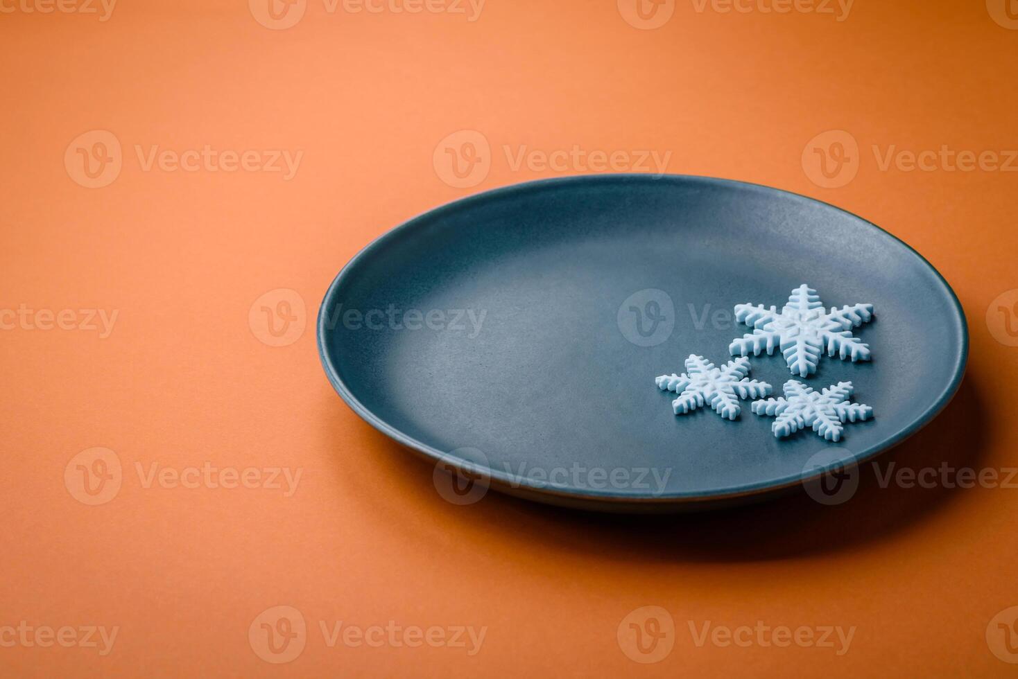 Beautiful winter snowflakes on a plain background with copy space photo