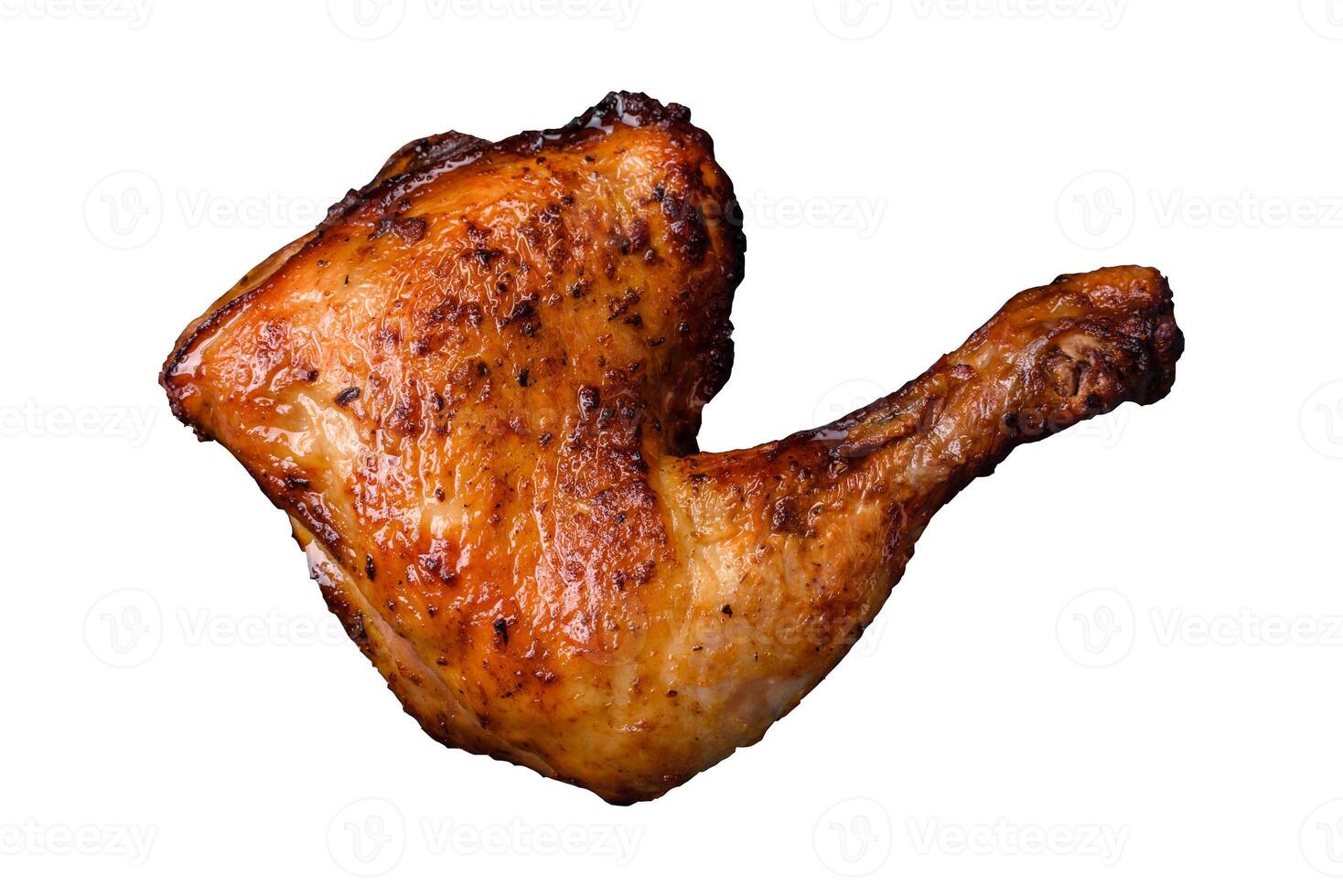 Delicious grilled chicken leg or quarter with salt and spices photo