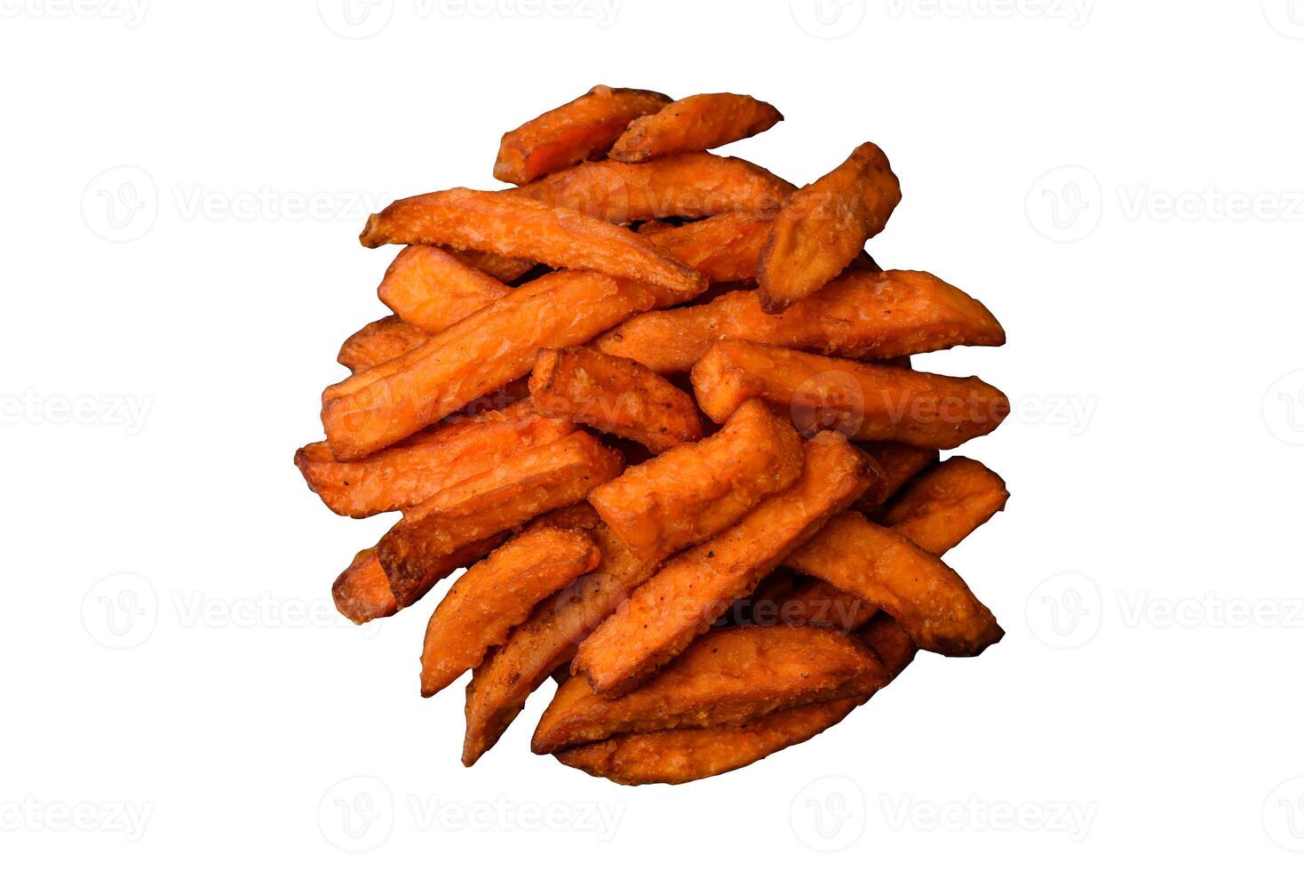 Delicious crispy sweet potato fries with salt, spices and herbs photo