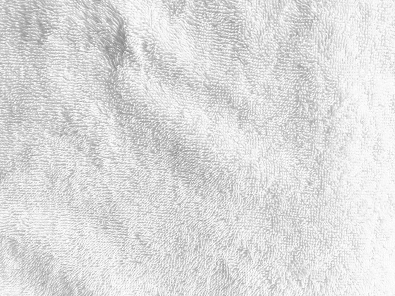 The soft and smooth surface of the cloth creates an abstract and luxurious backdrop, perfect for a sophisticated design. photo
