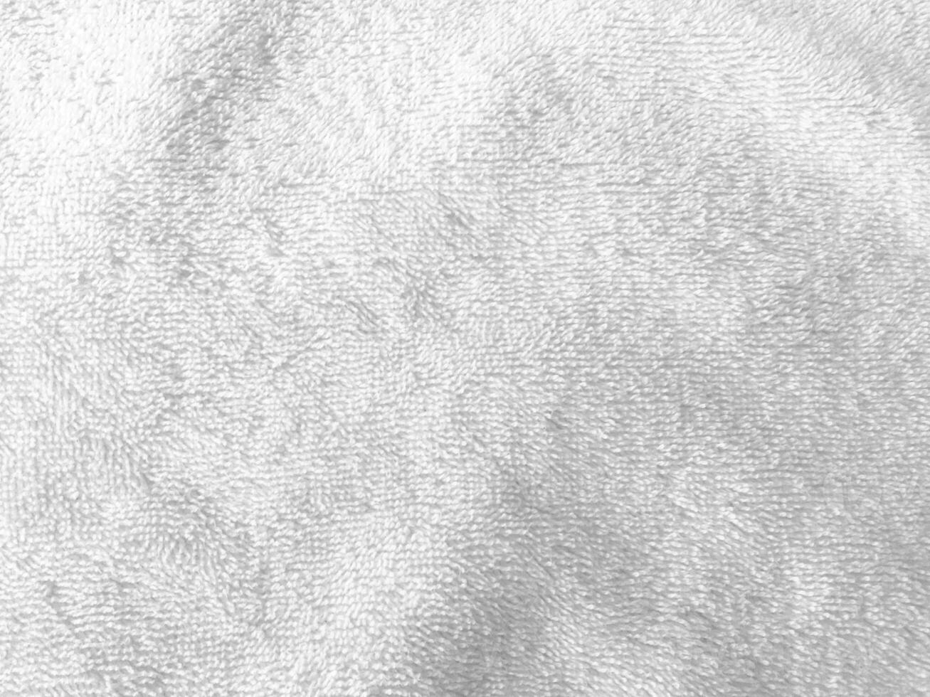 white fabric background, showcasing the exquisite texture of silk. copy space for design photo