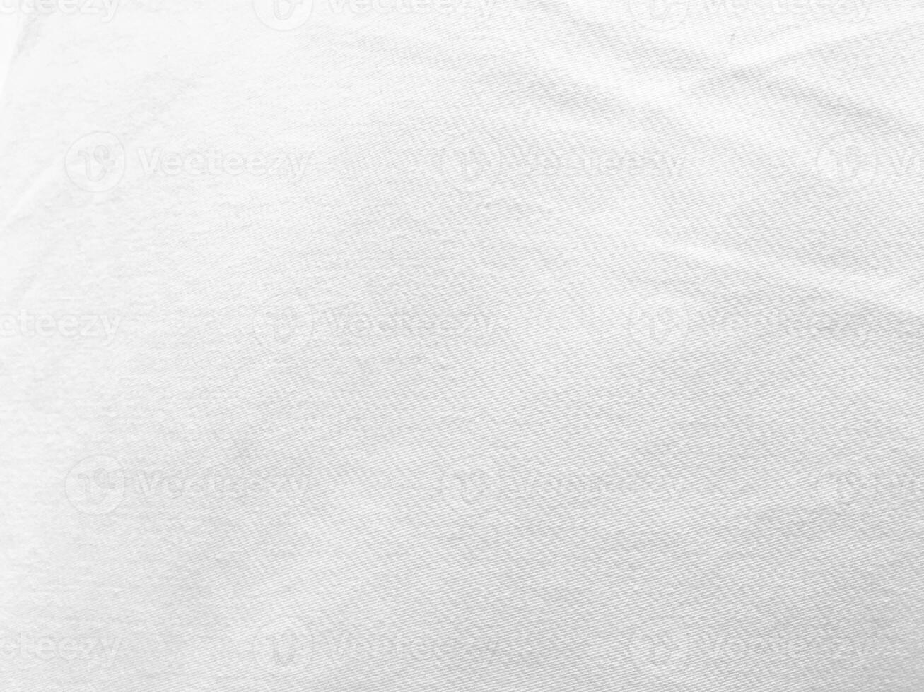 An empty space of white material, emphasizing the beauty of simplicity and purity in design, making it ideal for a variety of creative applications. photo