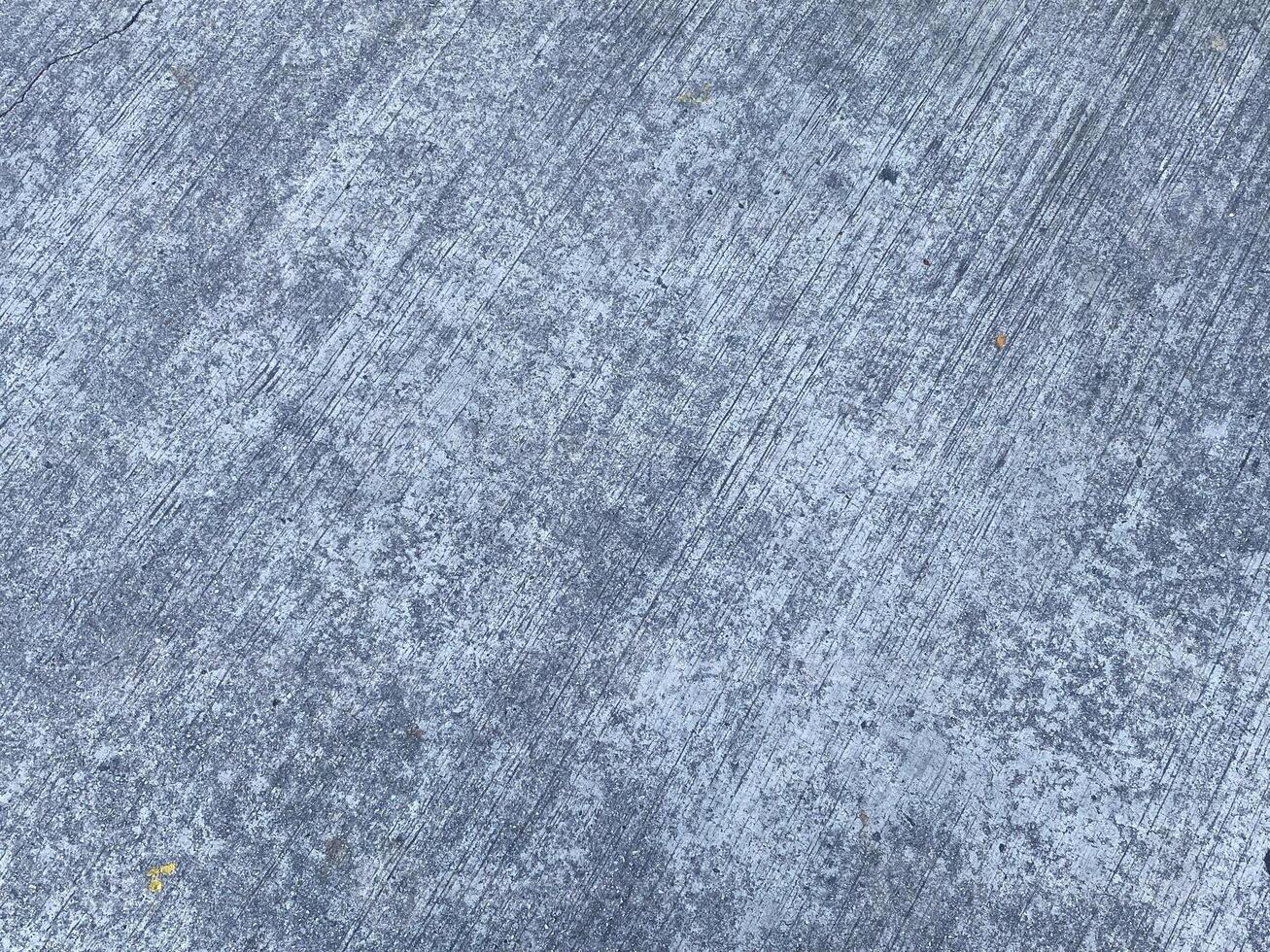 An antique concrete wall, weathered and worn, adding character to any project. photo