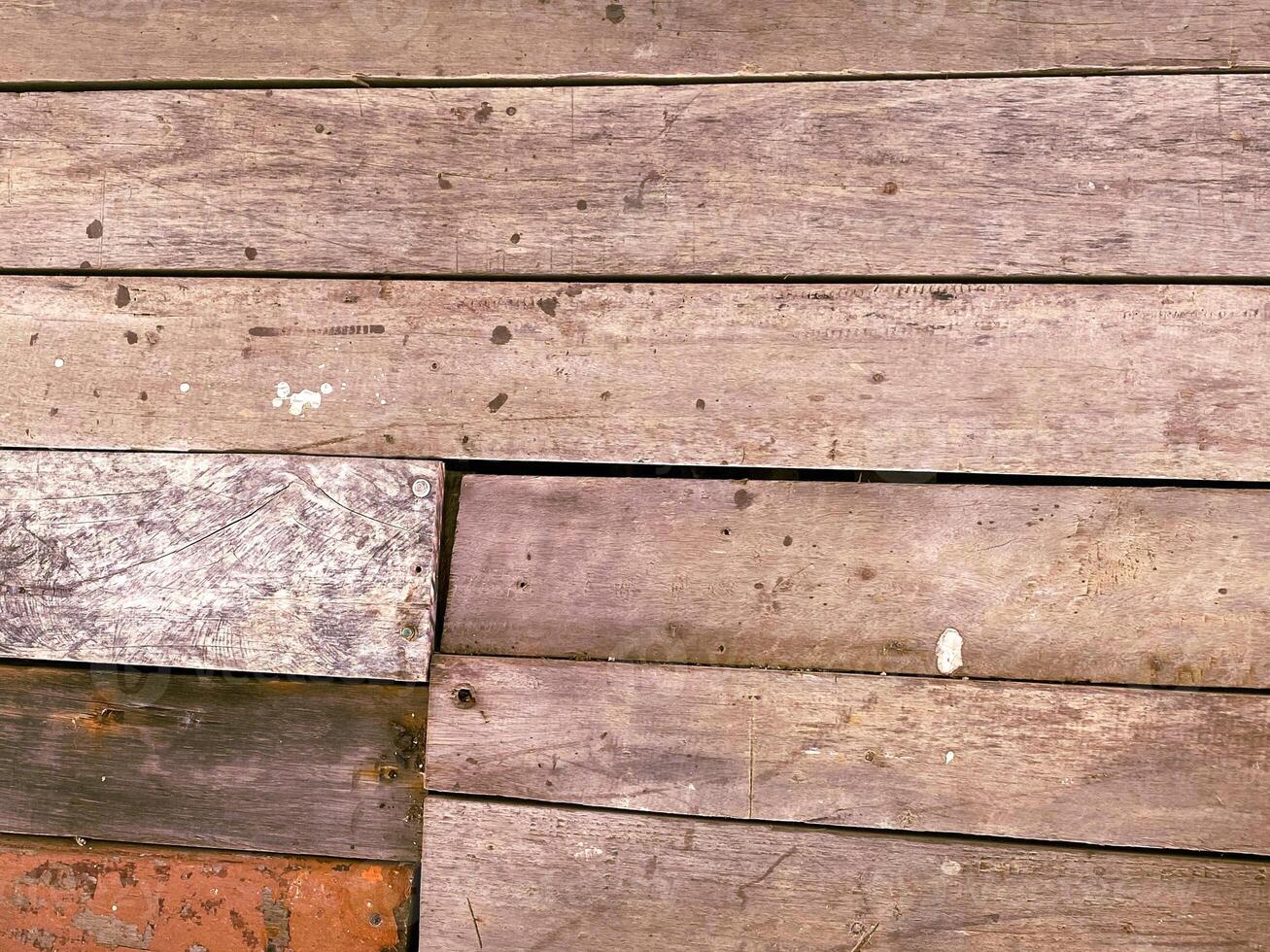 old wooden plank surface showcasing the natural grain and texture for a nostalgic backdrop. photo