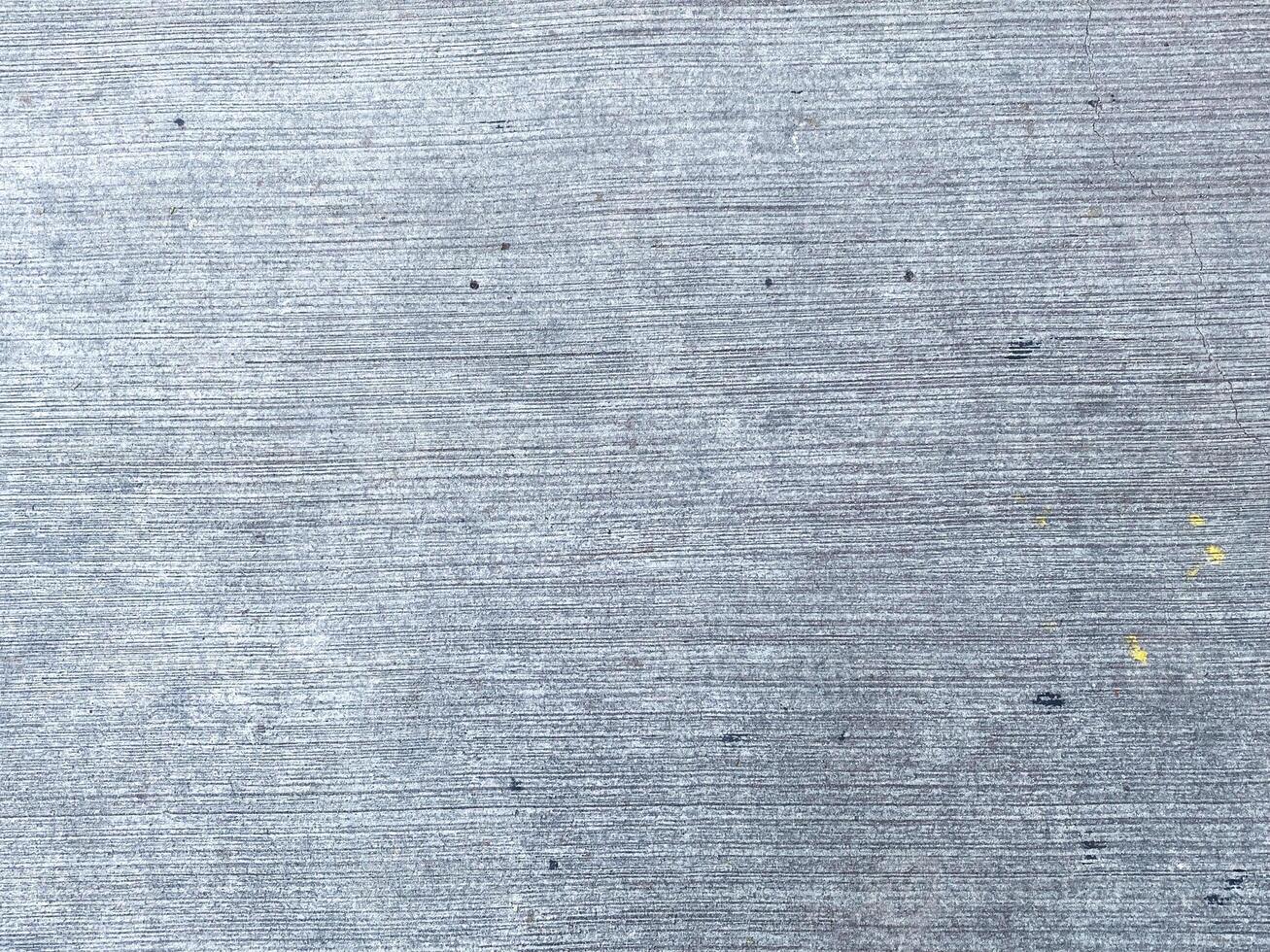 Closeup of a stucco surface, creating a textured and beautiful design element. photo