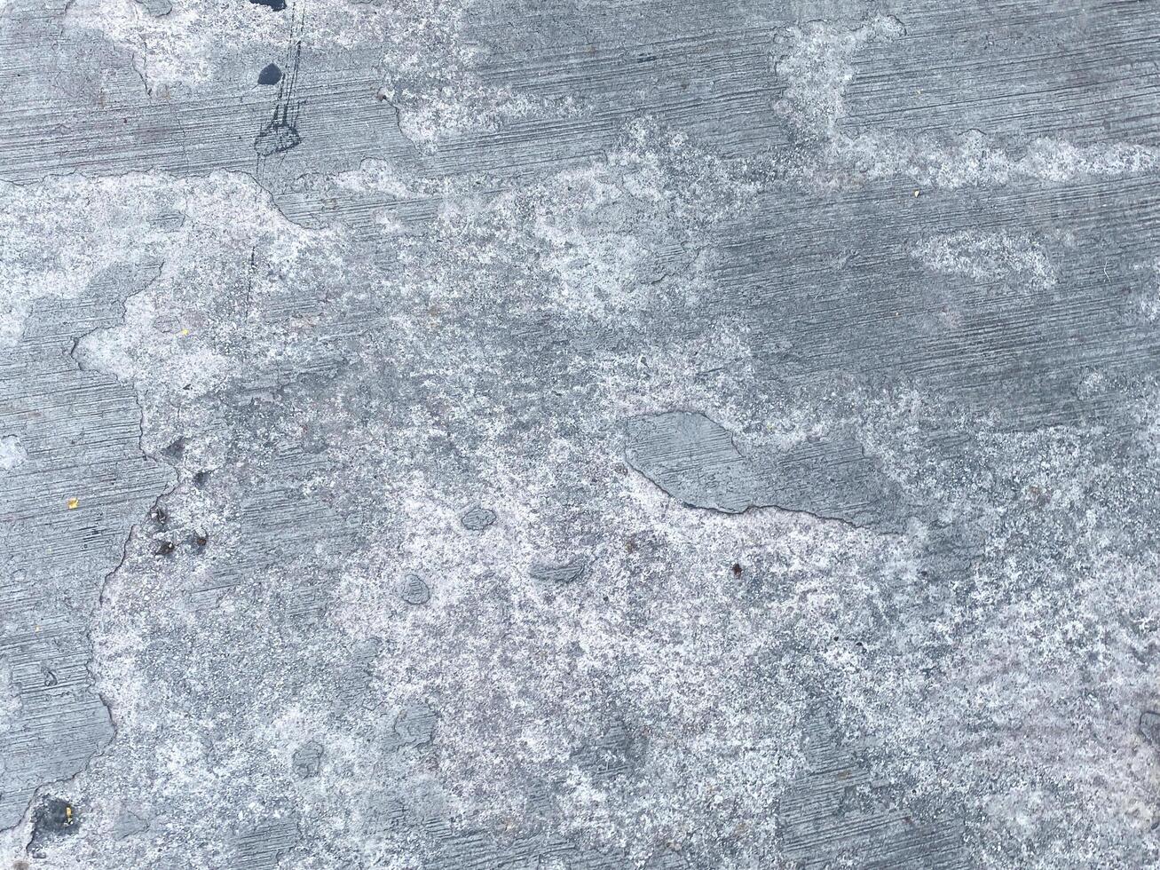 Closeup of a stucco surface, creating a textured and beautiful design element. photo