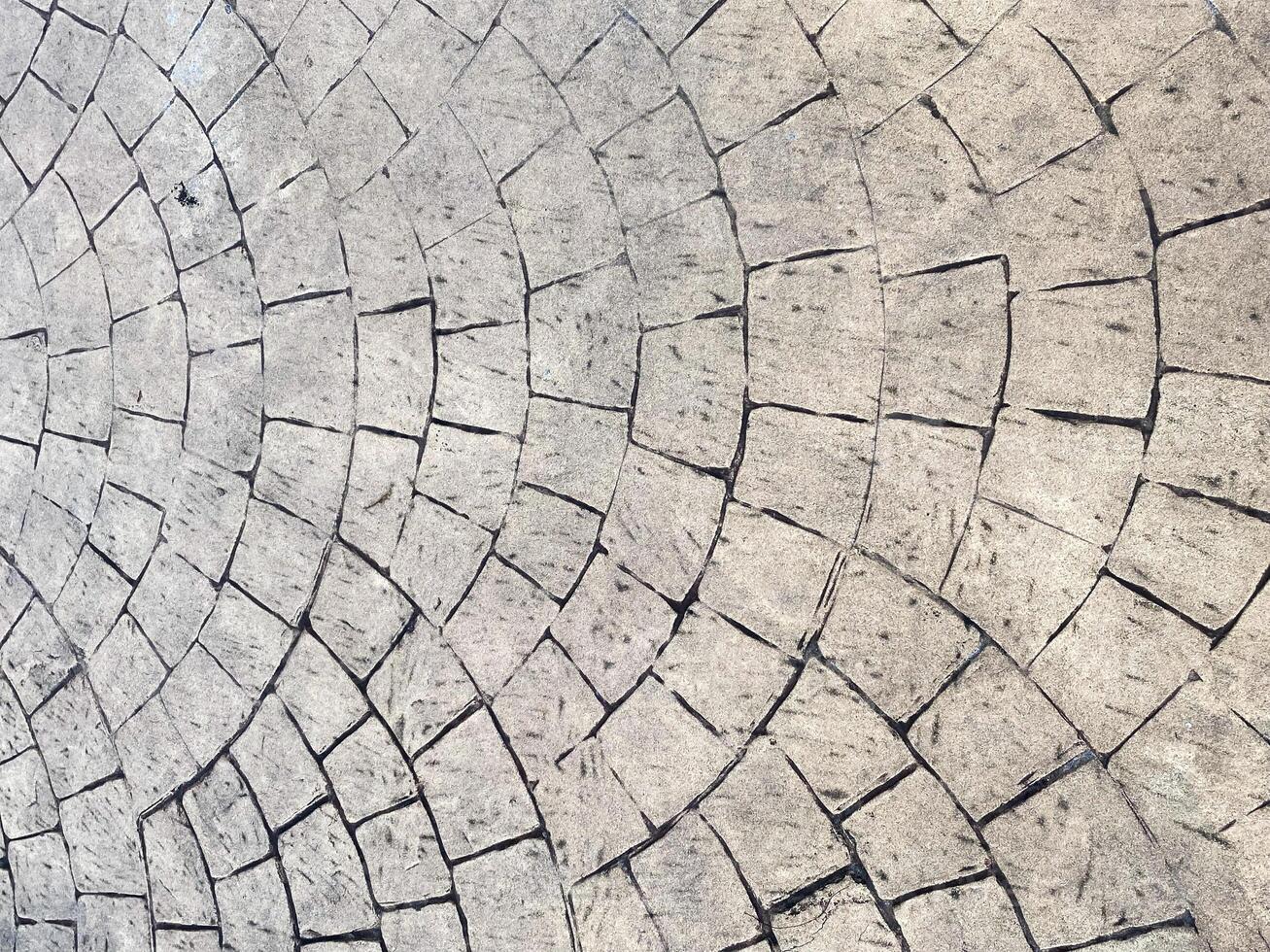 A dark and abstract concrete wall, adding depth and intrigue to your design. photo