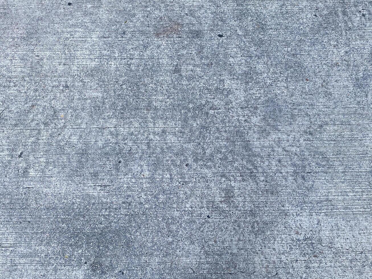 Grey and empty, this concrete background provides ample copy space for your design. photo