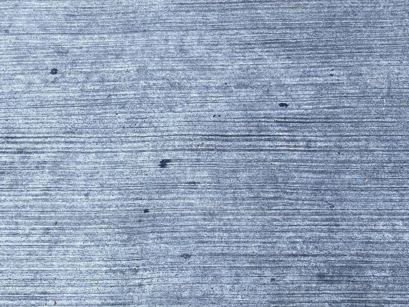 A retro wallpaper featuring a dark and scratched concrete texture.  copy space for design photo