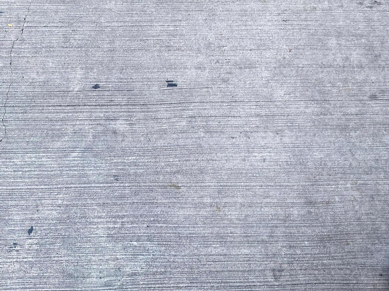 Closeup of a stucco surface, creating a textured and beautiful design element. photo