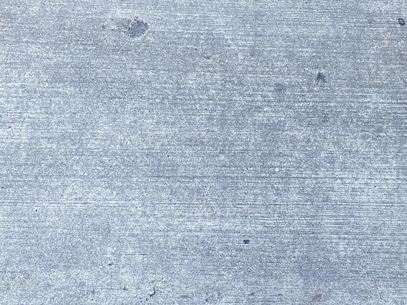 An antique concrete wall, weathered and worn, adding character to any project. photo