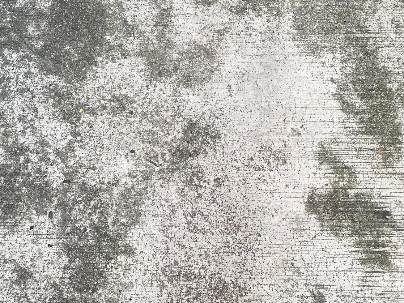 The rough and abstract surface of a concrete wall, perfect for a grunge design. photo