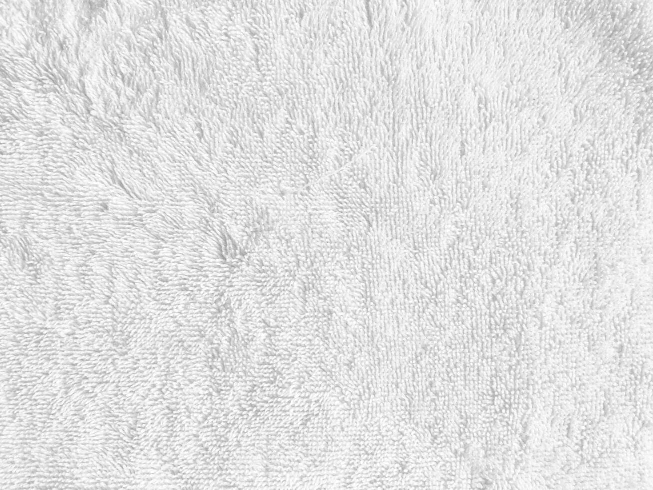 white fabric background, showcasing the exquisite texture of silk. copy space for design photo