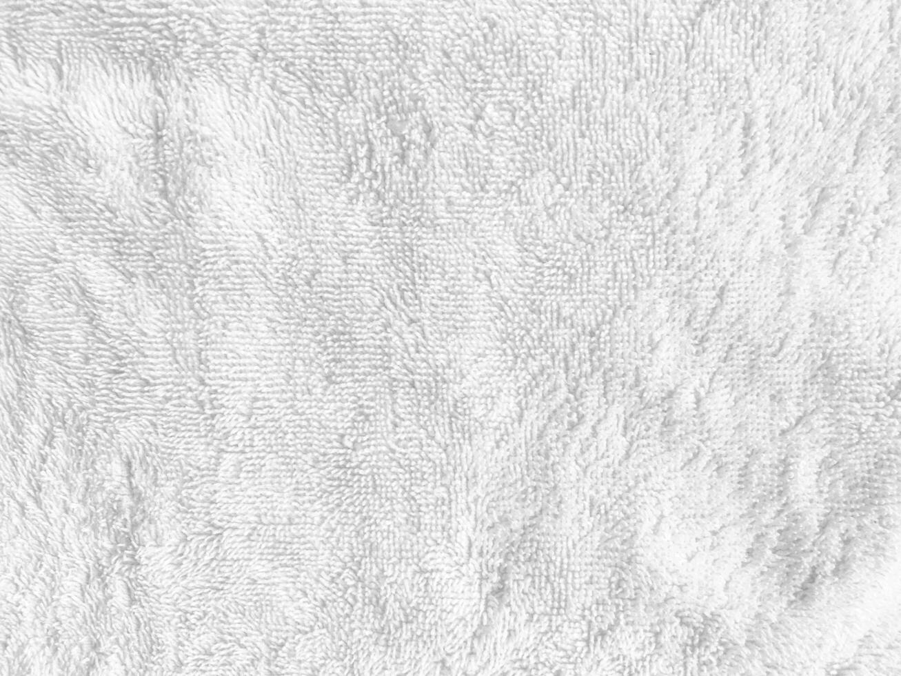 white fabric background, showcasing the exquisite texture of silk. copy space for design photo