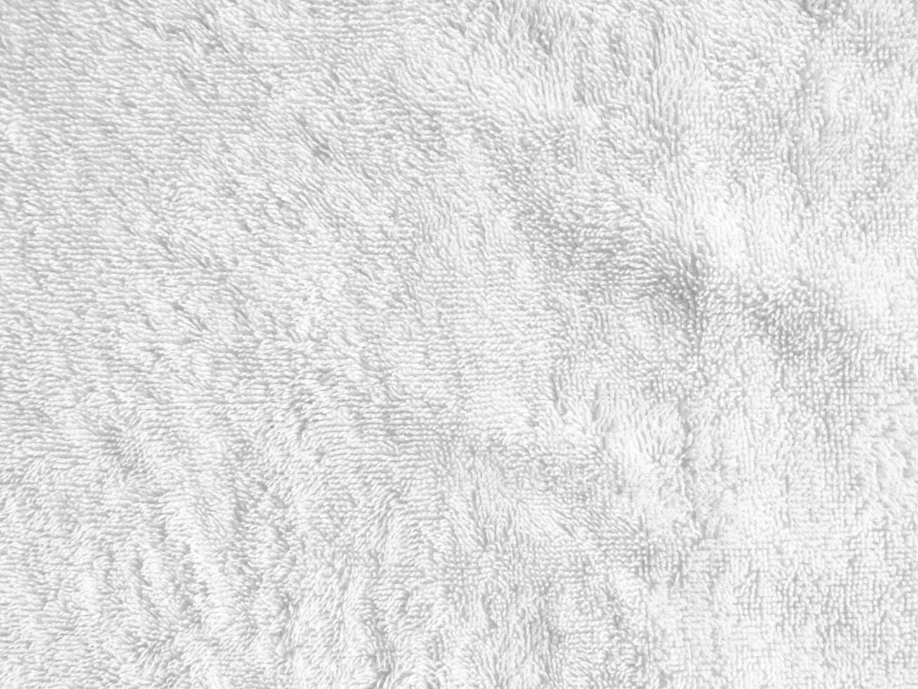white fabric background, showcasing the exquisite texture of silk. copy space for design photo