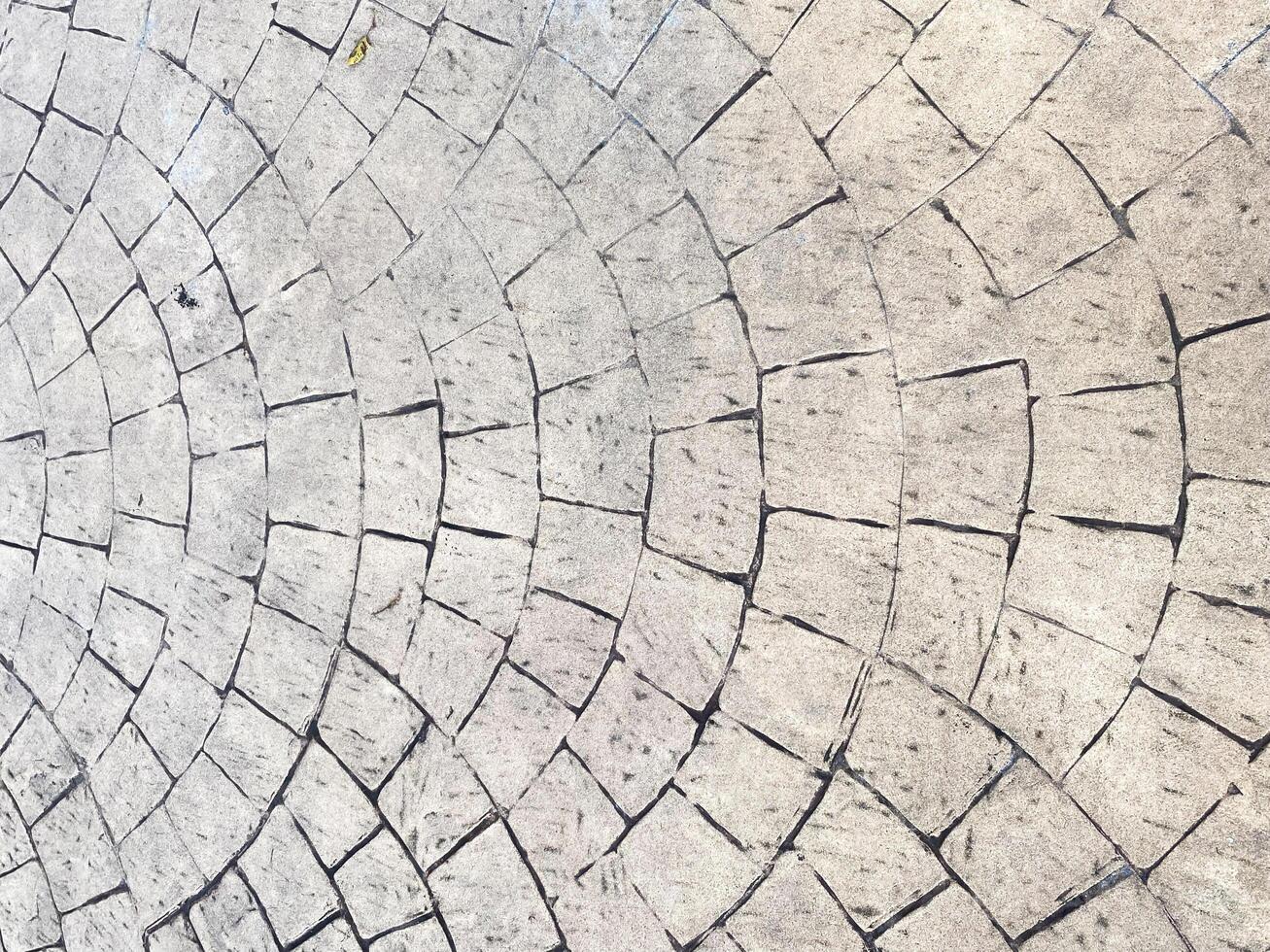 A dark and abstract concrete wall, adding depth and intrigue to your design. photo