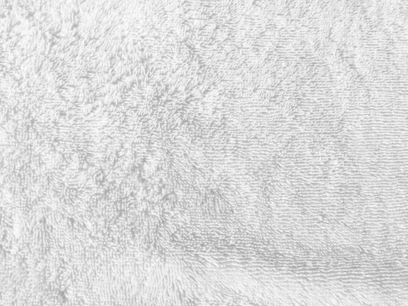 The soft and smooth surface of the cloth creates an abstract and luxurious backdrop, perfect for a sophisticated design. photo