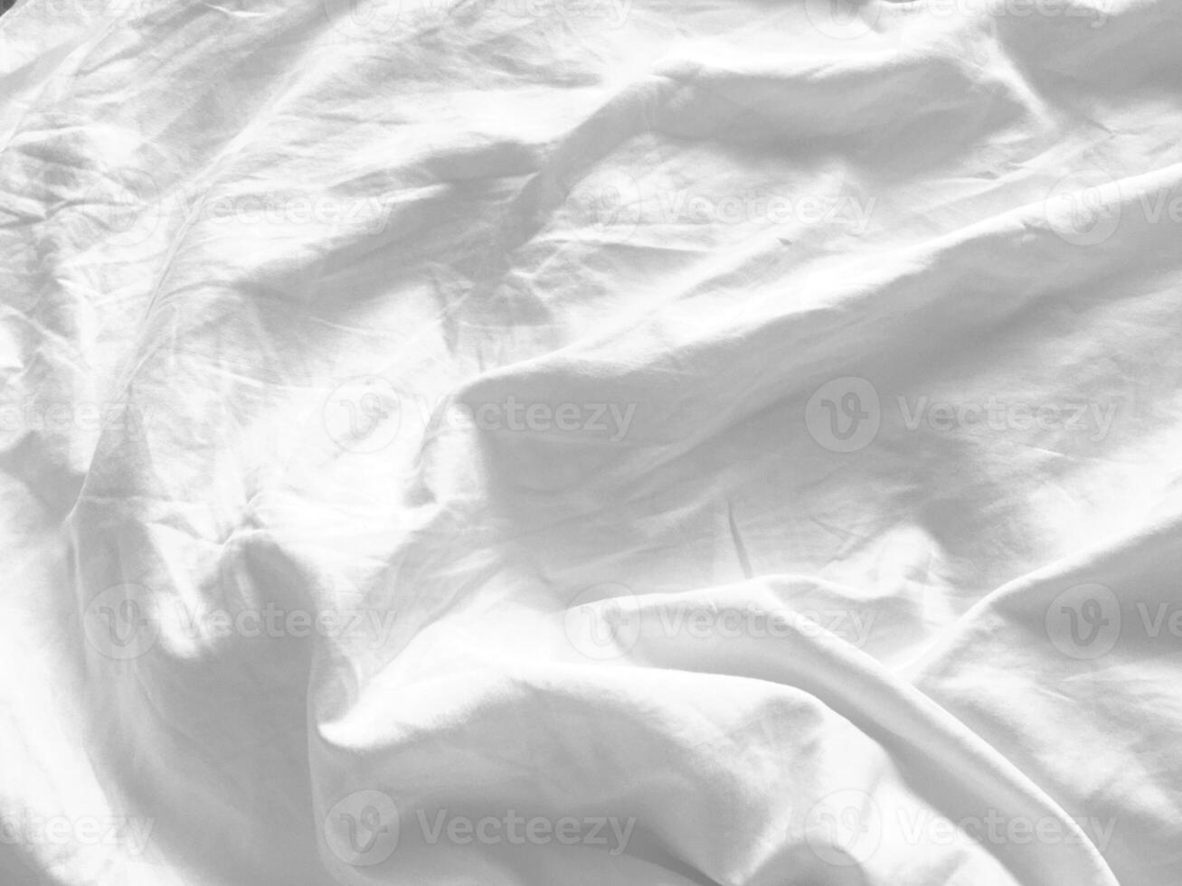 The line and pattern of this silky, white fabric create a visually appealing texture, enhancing the overall aesthetic and providing a sense of sophistication. photo