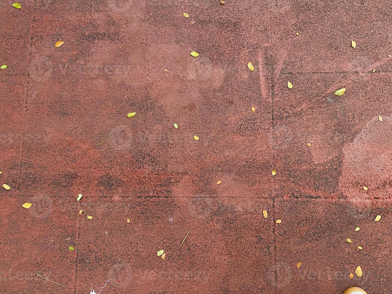 A striking red brick design takes center stage in this image, providing a visually interesting and abstract background. photo