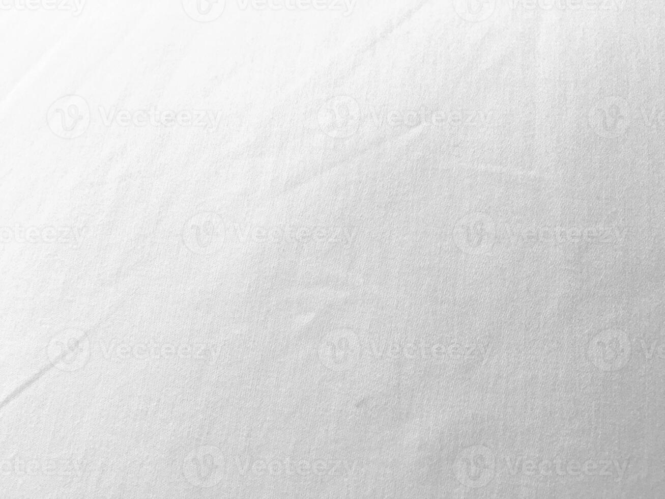 An exquisite cloth material in a bright, white hue, its smooth and silky surface evoking a sense of luxury and quality for a sophisticated background. photo
