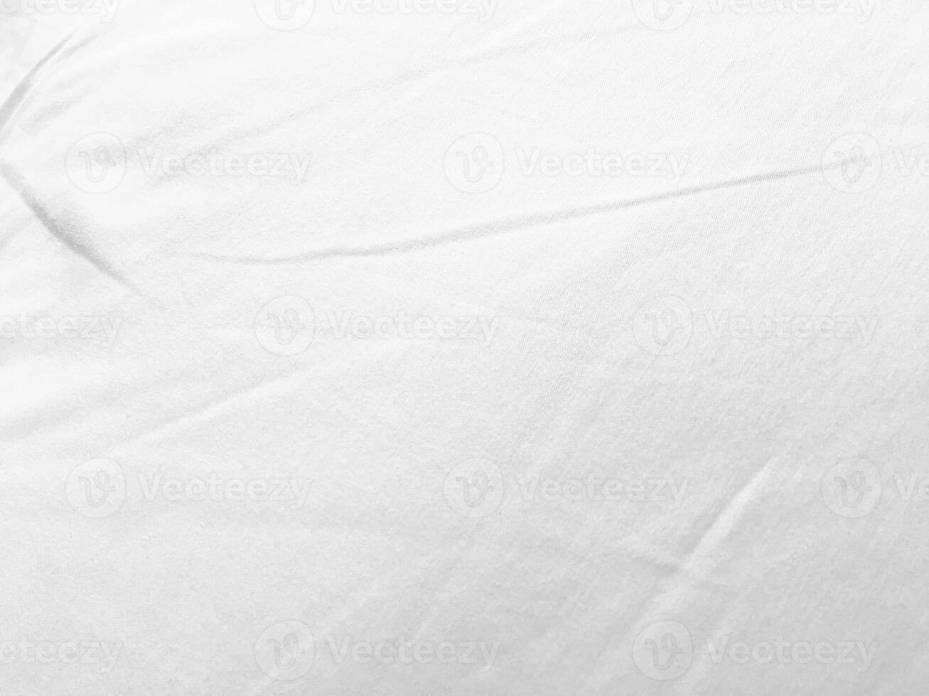 An exquisite cloth material in a bright, white hue, its smooth and silky surface evoking a sense of luxury and quality for a sophisticated background. photo