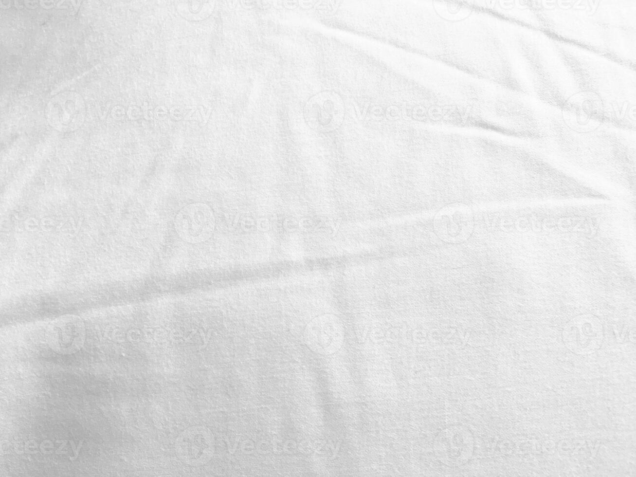 An exquisite cloth material in a bright, white hue, its smooth and silky surface evoking a sense of luxury and quality for a sophisticated background. photo