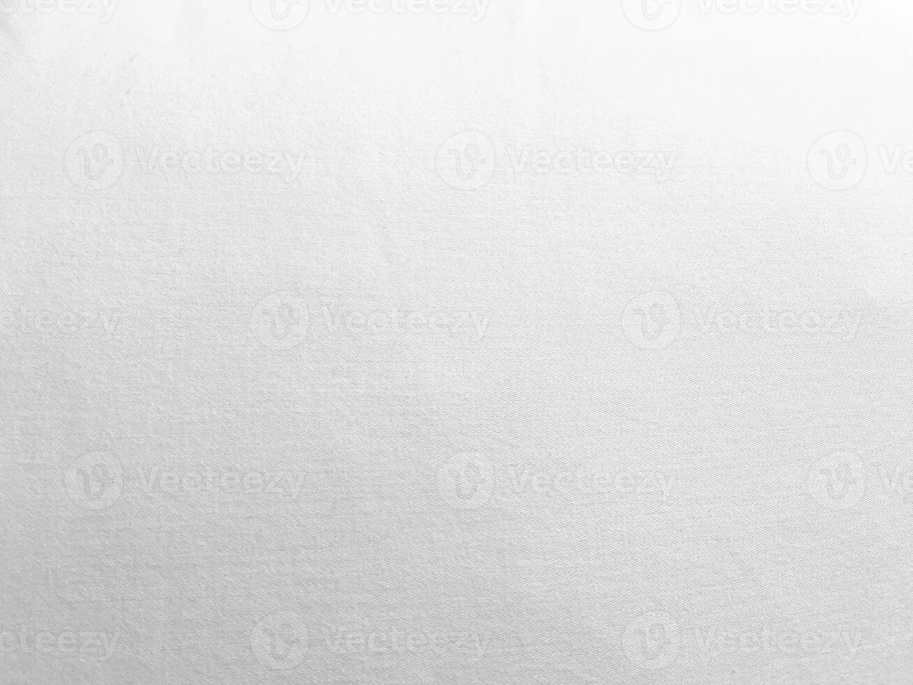 A pristine white fabric background showcasing the luxurious texture of silk, creating an abstract and soft ambiance perfect for a high-end design. photo