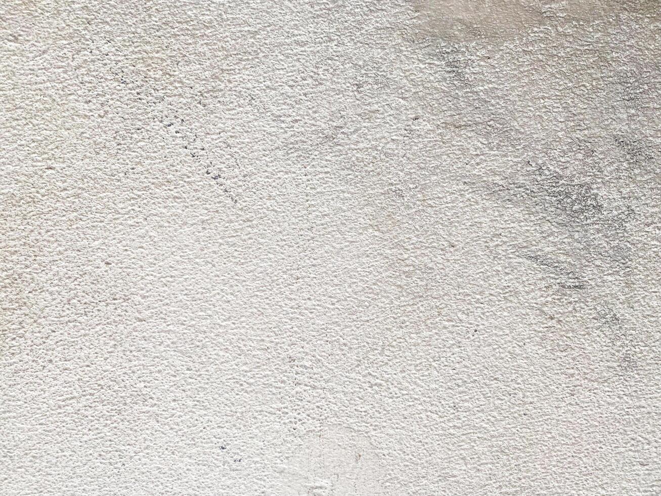 The rough surface of the concrete creates an interesting visual pattern. photo